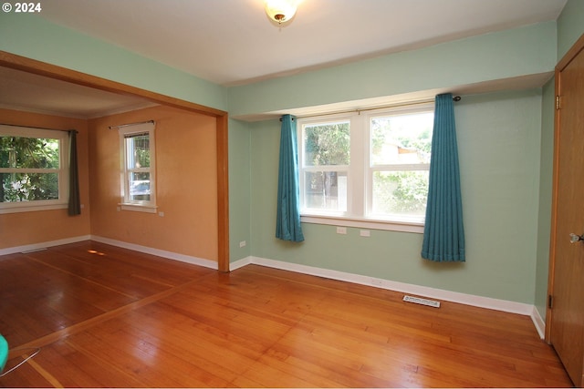 2309 SE 90th Ave, Portland, OR 97216 - empty room featuring hardwood / wood-style flooring and baseboards