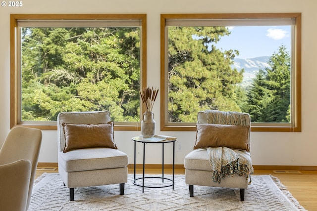 4719 Westwood Dr, Hood River, OR 97031 - sitting room featuring wood finished floors, a mountain view, baseboards, and healthy amount of natural light