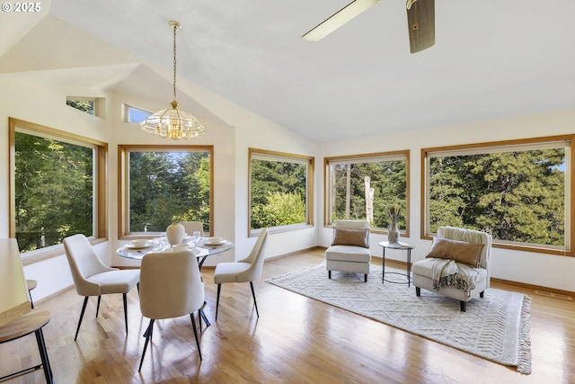 4719 Westwood Dr, Hood River, OR 97031 - sunroom with vaulted ceiling, a chandelier, wood finished floors, and baseboards