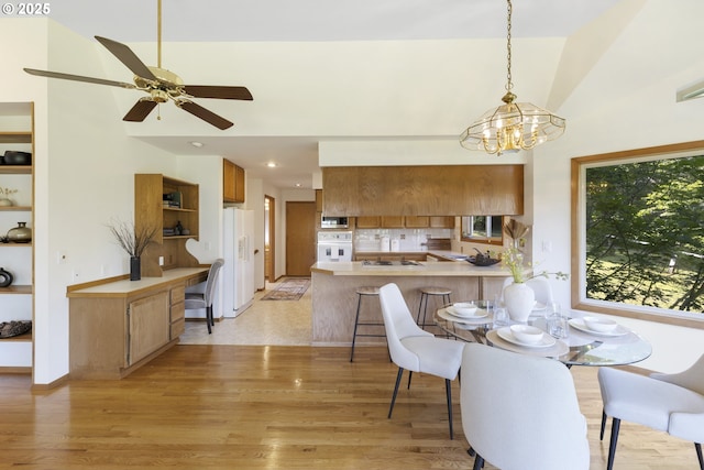 4719 Westwood Dr, Hood River, OR 97031 - dining room featuring light wood-style flooring, a chandelier, recessed lighting, and ceiling fan
