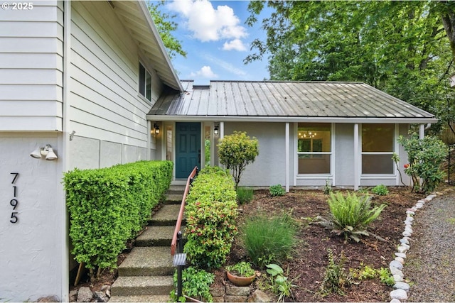view of front of house with metal roof