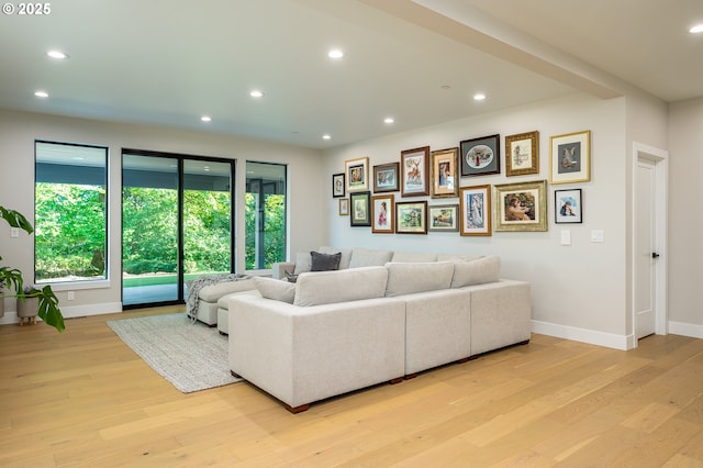 480 W U St, Washougal, WA 98671 - living area with healthy amount of natural light, light wood-style floors, baseboards, and recessed lighting