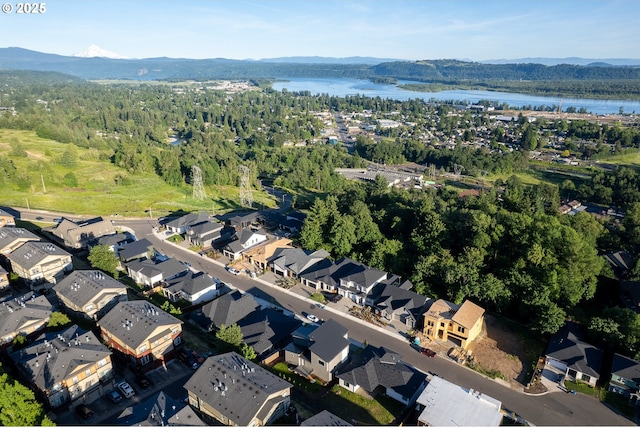 480 W U St, Washougal, WA 98671 - aerial overview of property's location featuring a water and mountain view, a forest, and nearby suburban area