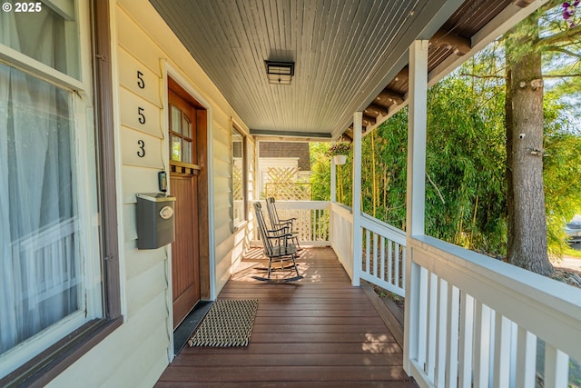 deck with covered porch