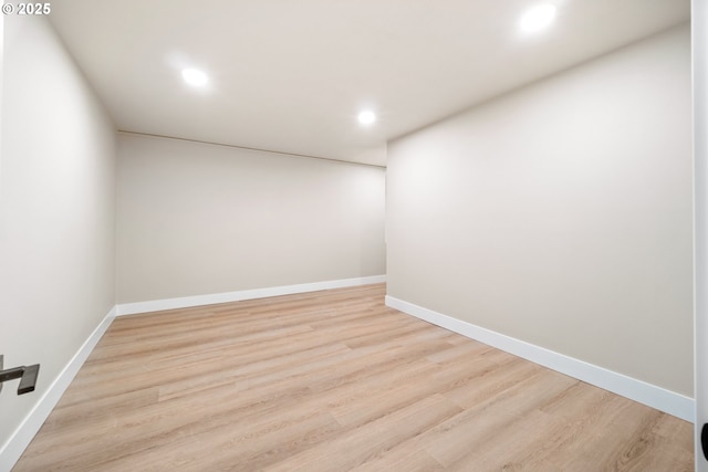 spare room featuring light wood-type flooring