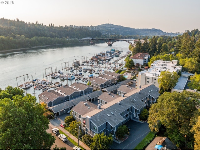 aerial view at dusk with a water view