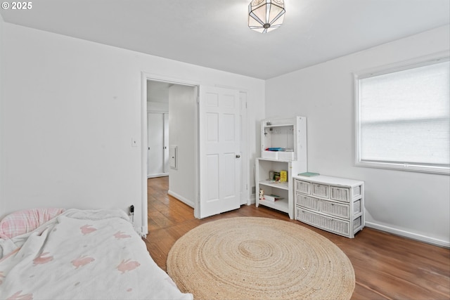 300 NE 148th Ave, Portland, OR 97230 - bedroom featuring wood finished floors and baseboards