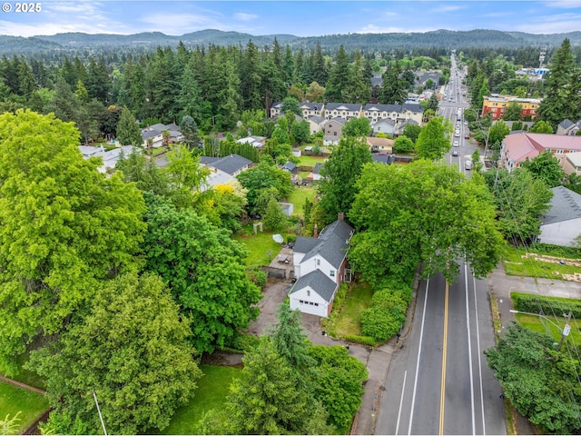 300 NE 148th Ave, Portland, OR 97230 - aerial perspective of suburban area with a forest and a mountainous background