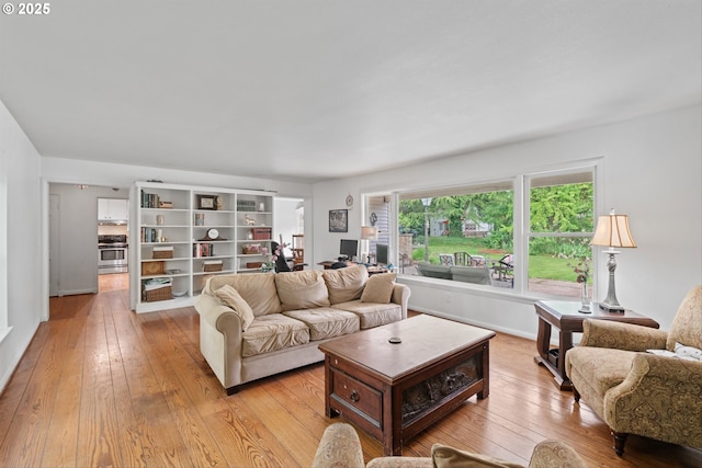 300 NE 148th Ave, Portland, OR 97230 - living room with light wood finished floors and baseboards