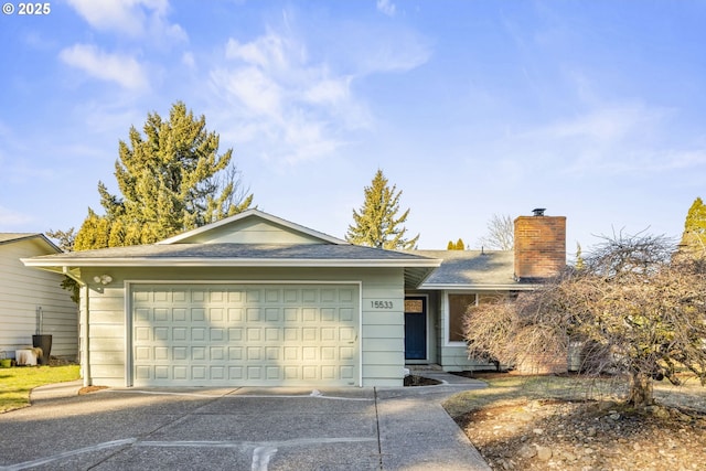 ranch-style home featuring a garage