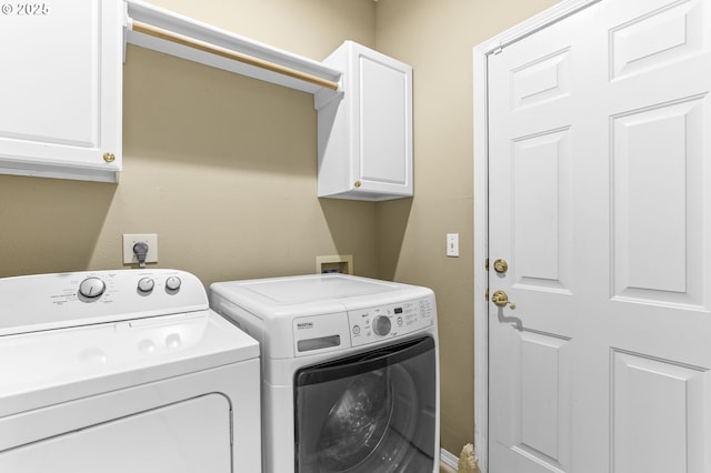 16800 NW Paddington Dr, Beaverton, OR 97006 - laundry area with washer and clothes dryer and cabinet space