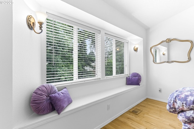 16800 NW Paddington Dr, Beaverton, OR 97006 - bedroom featuring multiple windows and wood finished floors