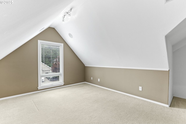 16800 NW Paddington Dr, Beaverton, OR 97006 - additional living space featuring carpet and vaulted ceiling
