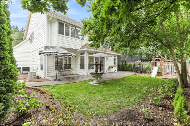 16800 NW Paddington Dr, Beaverton, OR 97006 - back of house featuring a patio and a playground