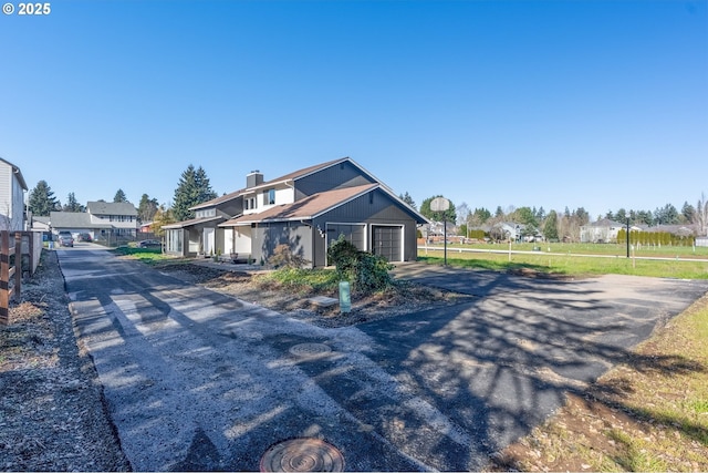 exterior space featuring a garage