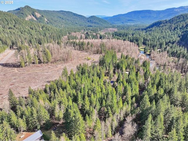 mountain view featuring a forest