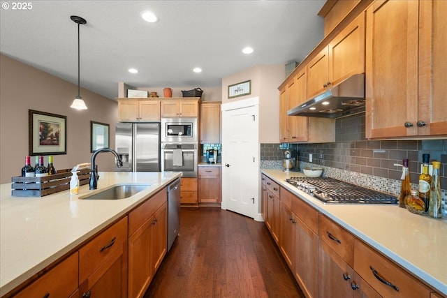 2336 Heather Way, Forest Grove, OR 97116 - kitchen featuring appliances with stainless steel finishes, a sink, under cabinet range hood, dark wood-style floors, and light countertops