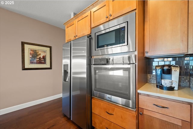 2336 Heather Way, Forest Grove, OR 97116 - kitchen featuring stainless steel appliances, baseboards, backsplash, dark wood-style flooring, and light countertops