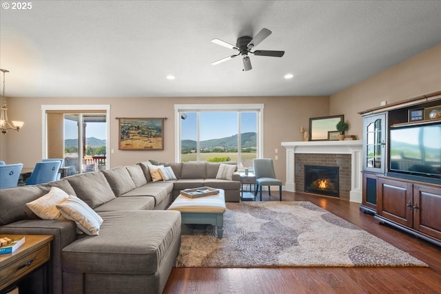 2336 Heather Way, Forest Grove, OR 97116 - living area with a chandelier, plenty of natural light, a fireplace, ceiling fan, and recessed lighting