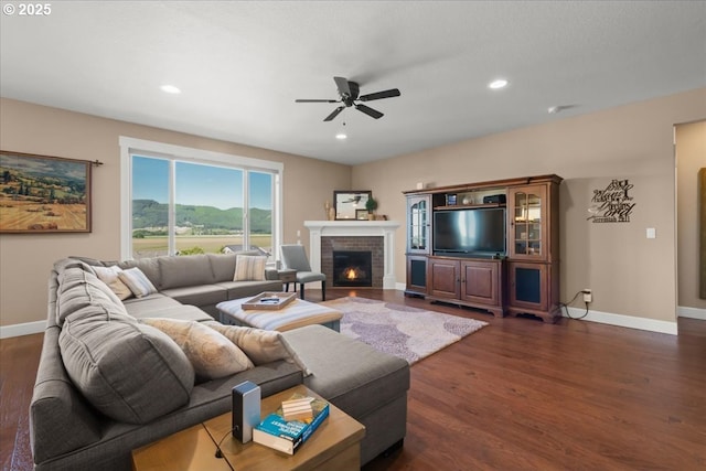 2336 Heather Way, Forest Grove, OR 97116 - living room with dark wood finished floors, baseboards, a ceiling fan, a fireplace, and recessed lighting