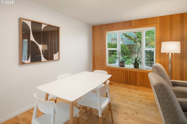 dining area with light wood finished floors