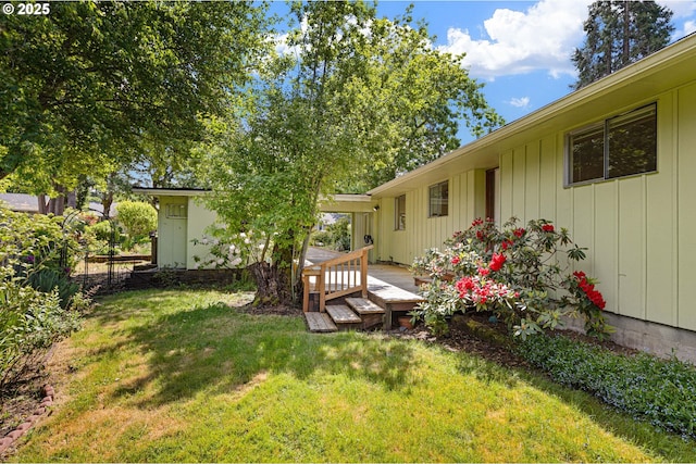 view of yard with a deck