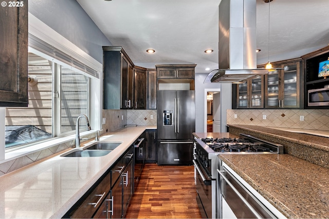 1155 Holly Ave, Cottage Grove, OR 97424 - kitchen with fridge with ice dispenser, gas stove, dark wood-type flooring, dark brown cabinets, and tasteful backsplash
