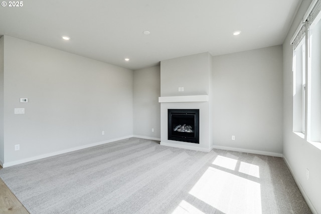 5332 SE 77th Ave, Hillsboro, OR 97123 - unfurnished living room featuring a fireplace and recessed lighting