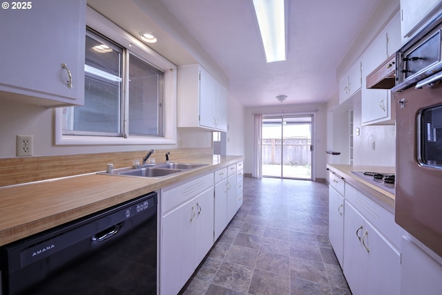 1742 Escalante St, Eugene, OR 97404 - kitchen featuring dishwasher, light countertops, white cabinetry, and cooktop