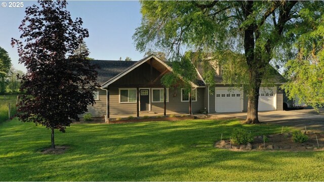 34949 Bond Rd, Lebanon, OR 97355 - view of front of property with an attached garage, a front lawn, driveway, and covered porch