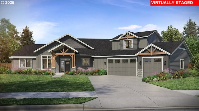 craftsman-style home featuring concrete driveway, board and batten siding, a garage, stone siding, and a front lawn