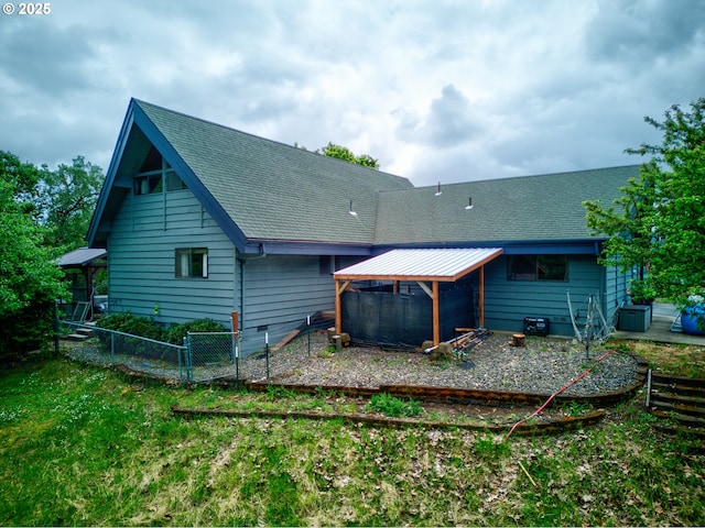 596 Sable Dr, Roseburg, OR 97470 - rear view of house featuring roof with shingles and fence