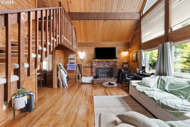 596 Sable Dr, Roseburg, OR 97470 - living area with wood-type flooring, wood walls, beamed ceiling, high vaulted ceiling, and wood ceiling