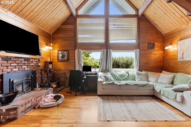 596 Sable Dr, Roseburg, OR 97470 - living room with vaulted ceiling, wood walls, hardwood / wood-style floors, wooden ceiling, and a fireplace