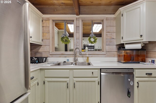 596 Sable Dr, Roseburg, OR 97470 - kitchen featuring appliances with stainless steel finishes, wooden ceiling, a sink, light countertops, and beam ceiling