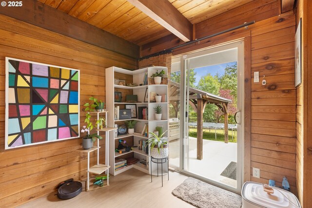 596 Sable Dr, Roseburg, OR 97470 - doorway with wood walls, beamed ceiling, wood ceiling, and wood finished floors