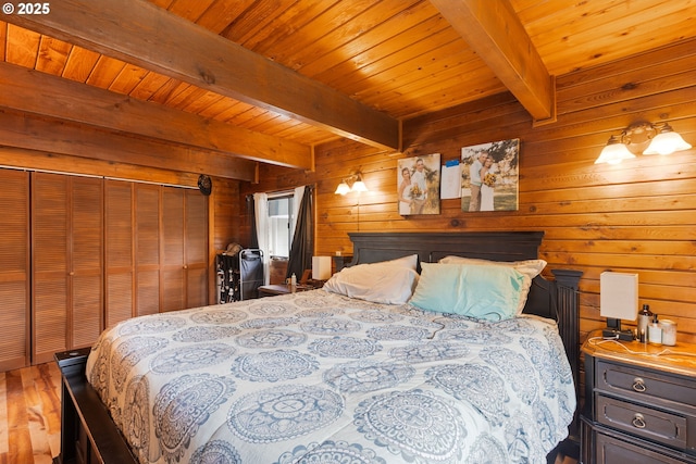 596 Sable Dr, Roseburg, OR 97470 - bedroom with beam ceiling, wood ceiling, wood finished floors, and wood walls