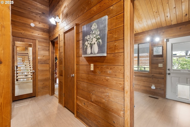596 Sable Dr, Roseburg, OR 97470 - corridor featuring wood walls and light floors