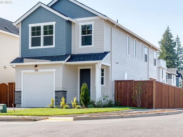 532 SW 23rd St, Battle Ground, WA 98604 - view of front of house with an attached garage and roof with shingles