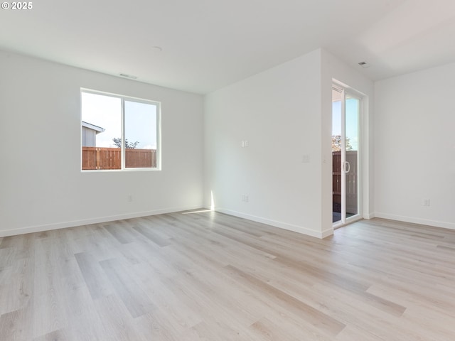 532 SW 23rd St, Battle Ground, WA 98604 - unfurnished room with plenty of natural light, light wood-style flooring, and baseboards