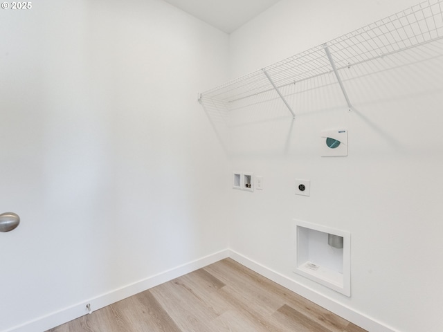 532 SW 23rd St, Battle Ground, WA 98604 - washroom featuring light wood-style flooring, baseboards, hookup for an electric dryer, and washer hookup