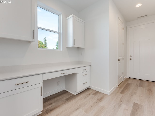 532 SW 23rd St, Battle Ground, WA 98604 - unfurnished office featuring built in desk, light wood finished floors, baseboards, and recessed lighting
