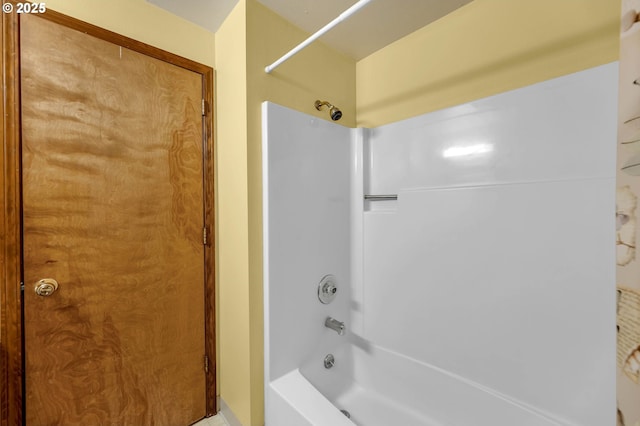 bathroom with shower / bathtub combination