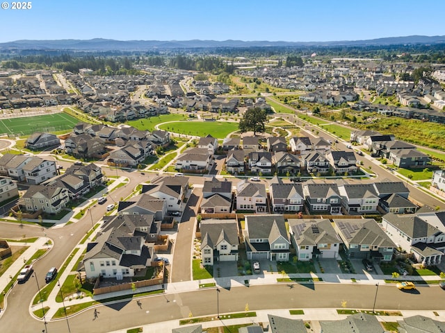 drone / aerial view featuring a mountain view