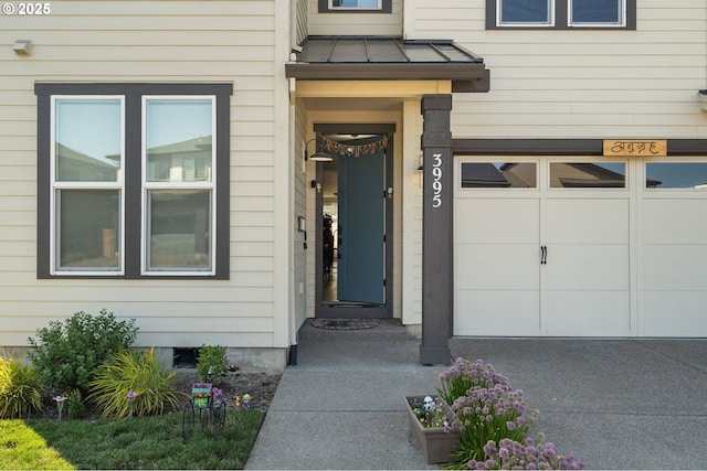 entrance to property featuring a garage