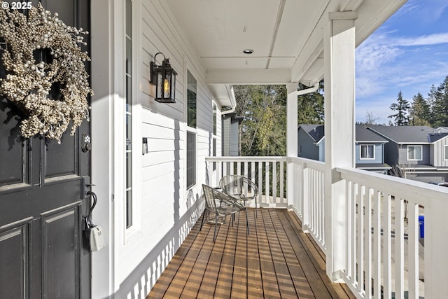 balcony featuring a porch