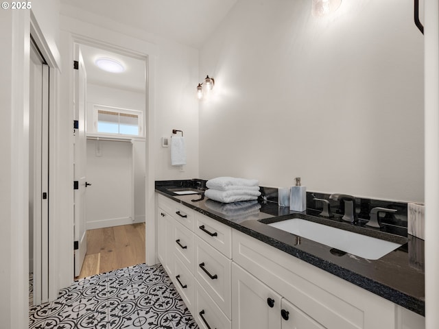 bathroom featuring vanity and hardwood / wood-style floors