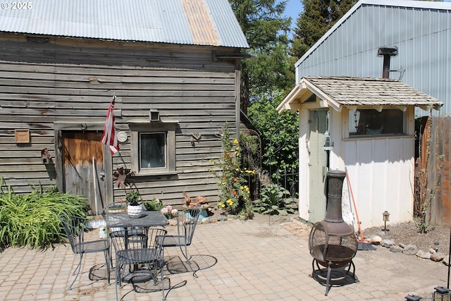 1407 9th St, Baker City, OR 97814 - view of patio / terrace featuring an outdoor fire pit and outdoor dining space