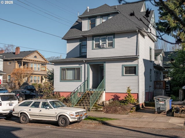 2312 SE Madison St, Portland, OR 97214 - view of front of home with entry steps and a shingled roof