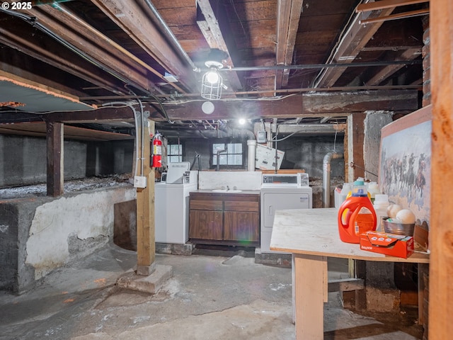 basement with washing machine and clothes dryer